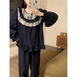 Navy blue lace-trimmed long-sleeve pajama set with sweet ruffles and cottagecore style