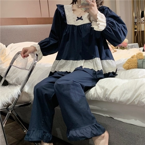 Vintage navy blue long sleeve pajama set with white lace trim and square neckline