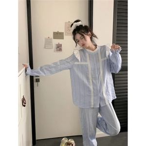 Women's light blue lace trim pajama set with long sleeves and white striped texture