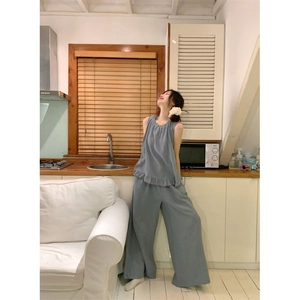 Peacock blue loungewear set with sleeveless ruffle top and loose wide-leg trousers