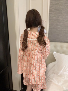 Back view of cute Teddy Bear pajama set with lace trim and red vertical stripes