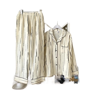 Minimalist black and white striped cotton pajama set with long sleeves and pants
