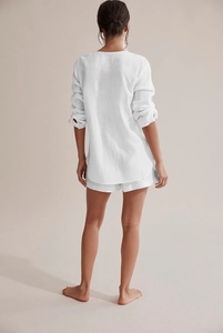 Back view of white double-layer gauze pajama set with long sleeves and casual shorts