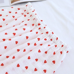 Close-up of heart print cotton pajama pants featuring a stretchy elastic waistband