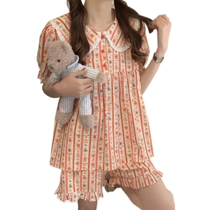 Women's two-piece orange pajama set with cute bear print and lace collar