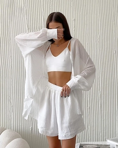 Detail of white three-piece set with striped texture shirt, camisole and wide shorts