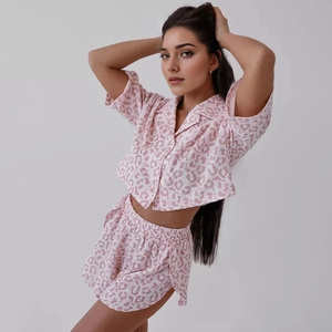Detail of pink leopard print pajama set with short sleeves and matching shorts