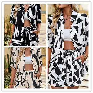 Women's two-piece summer set featuring abstract print short sleeve shirt and drawstring shorts