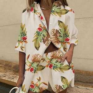 Women's tropical print two-piece set featuring short sleeve shirt and high waist shorts