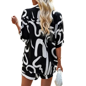 Women's 2-piece summer lounge set with black and white abstract print shirt and shorts