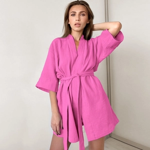 Women's pink crepe kimono bathrobe with tie waist and soft textured short sleeve design