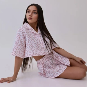 Women's pink leopard print cotton pajama set with short sleeve top and side slit shorts