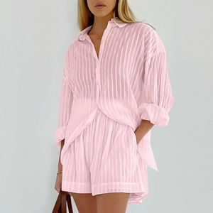Chic light pink vertical striped set with puff sleeve shirt and matching shorts