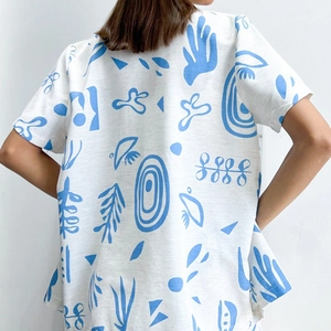 Short sleeve white linen shirt with blue abstract artistic print on the back