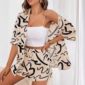 Women's casual two-piece shirt and shorts set with black abstract print in cream