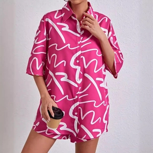Chic two-piece summer set with fuchsia abstract scribble print shirt and shorts
