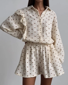 Detail of ruffle trim and heart pattern on breathable cotton muslin loungewear set