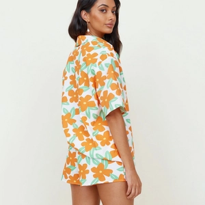 Pigiama floreale da donna 2 pezzi con camicia a maniche corte e pantaloncini arancioni