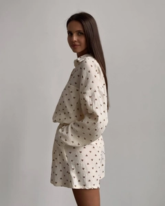 Detail of ruffle cotton linen loungewear set with heart print and button-up front