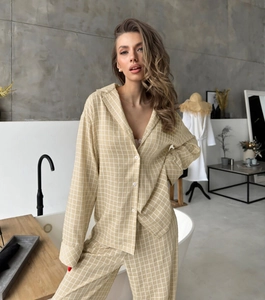 Detail view of plaid lounge set fabric showing checkered pattern and soft texture