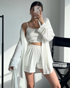 Detail view of white ribbed three-piece loungewear set with cardigan and shorts