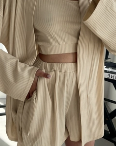 Detailed view of women's 3-piece ribbed knit loungewear set with soft texture