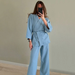 Women's light blue cotton long-sleeve pajama set with kimono wrap top and wide-leg pants