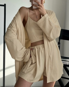 Detail showing the rib-knit texture of the beige 3-piece loungewear set with cardigan