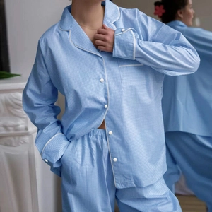 Classic blue gingham pajama set with long sleeves and white piping detail for women