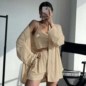 Three-piece ribbed knit lounge set with long-sleeve cardigan, camisole, and shorts