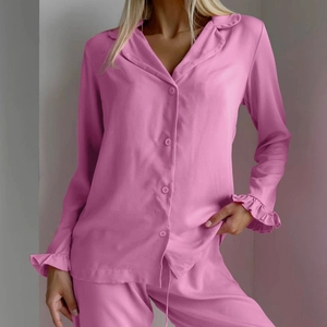 Pink ruffle long sleeve pajama set for women with button-up collar and matching pants