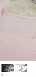 Detailed view of pink knitted tank top fabric texture with breathable diamond pattern