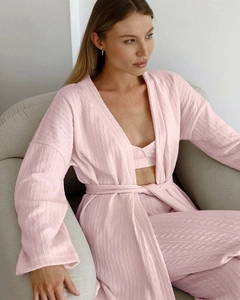 Detail of pink three-piece knit loungewear set with soft waffle texture and cardigan