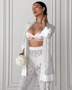 Detail of elegant floral lace stitching on premium women pajama loungewear set