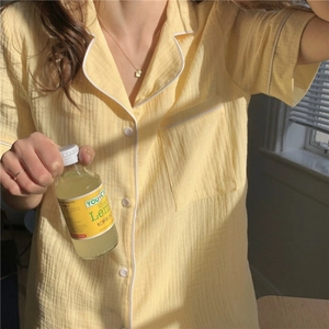 Short sleeve lemon yellow gauze pajama set for women with lapel collar and pocket