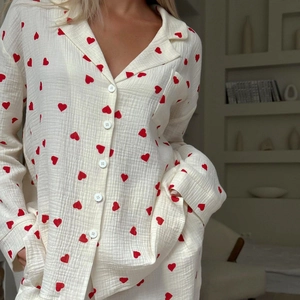 Women's white cotton pajama set with red heart print featuring long sleeves and pants
