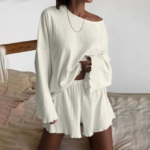 Women's white ribbed knit two-piece pajama set with lettuce trim and elastic shorts
