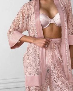 Detailed view of pink floral lace loungewear set with satin trim and matching pants