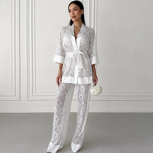 Elegant white floral lace pajama set with kimono top and wide leg pants for women