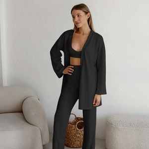 Three-piece black knit loungewear set featuring a long cardigan, V-neck top, and wide trousers
