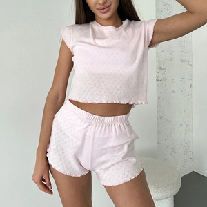 Pink knit summer pajama set with openwork heart pattern and ruffled hem for women