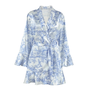 Women's blue floral satin robe with ruffles and Toile de Jouy print on a white background