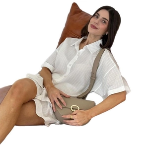 Women's summer two-piece pajama set with white striped short sleeve shirt and shorts