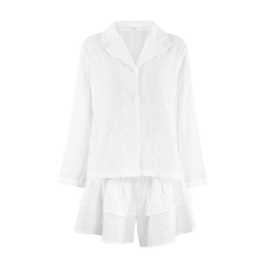 Women's white cotton loungewear set with long sleeve button top and ruffled shorts