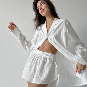 White ribbed cotton long sleeve pajama set with button-down shirt and elastic shorts