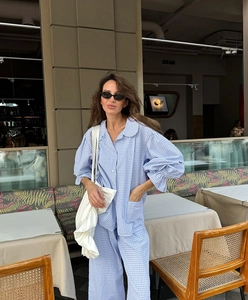 Detailed blue and white gingham lounge set with puff sleeves and wide-leg trousers