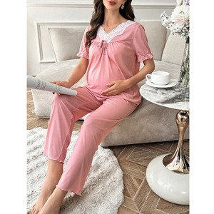 Pink two-piece maternity loungewear set with V-neck lace trim and short sleeves