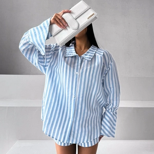 Women's blue striped loungewear set with long sleeve shirt and matching shorts