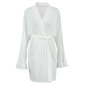White knit robe featuring long sleeves with ruffle cuffs and a waist tie closure