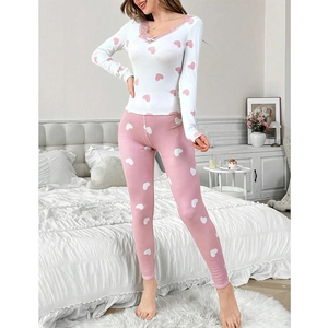 Women's heart print pajama set with pink lace V-neck top and slim-fit trousers